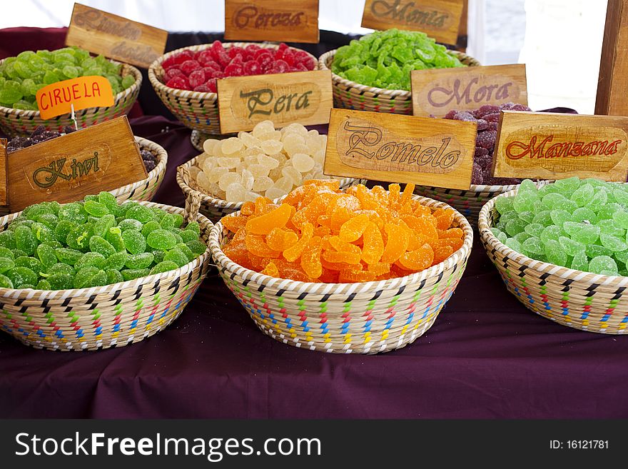 Assortment of colorful candy in wicker basket