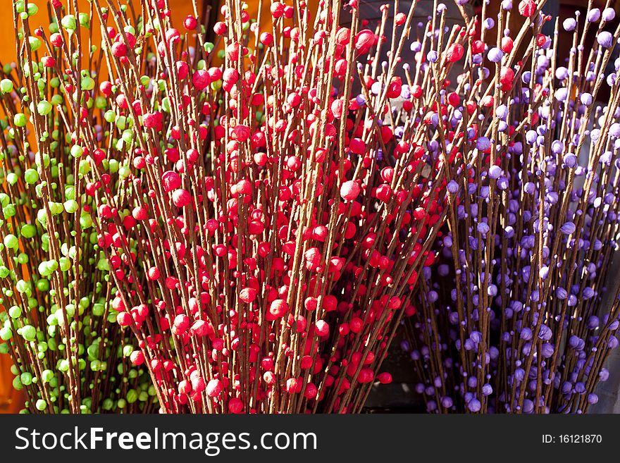 Textures with colored paper flowers