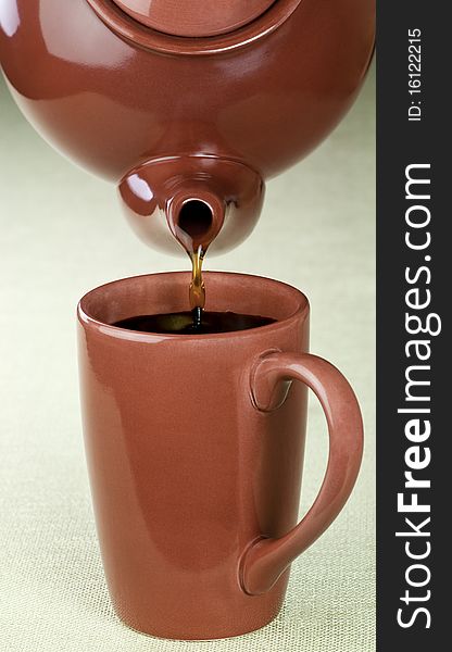 Coffee being poured  from a pot. Coffee being poured  from a pot
