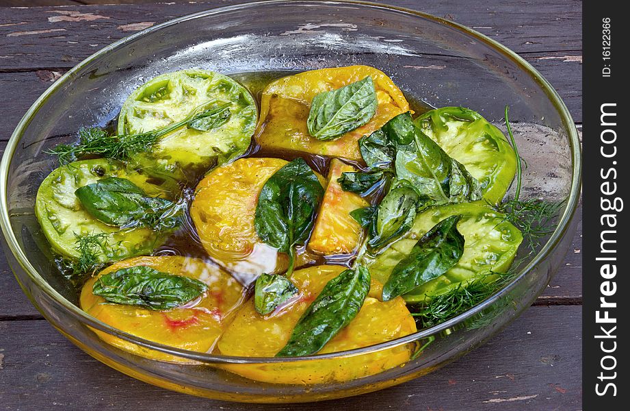 This is an image of marinated heirloom tomatoes.