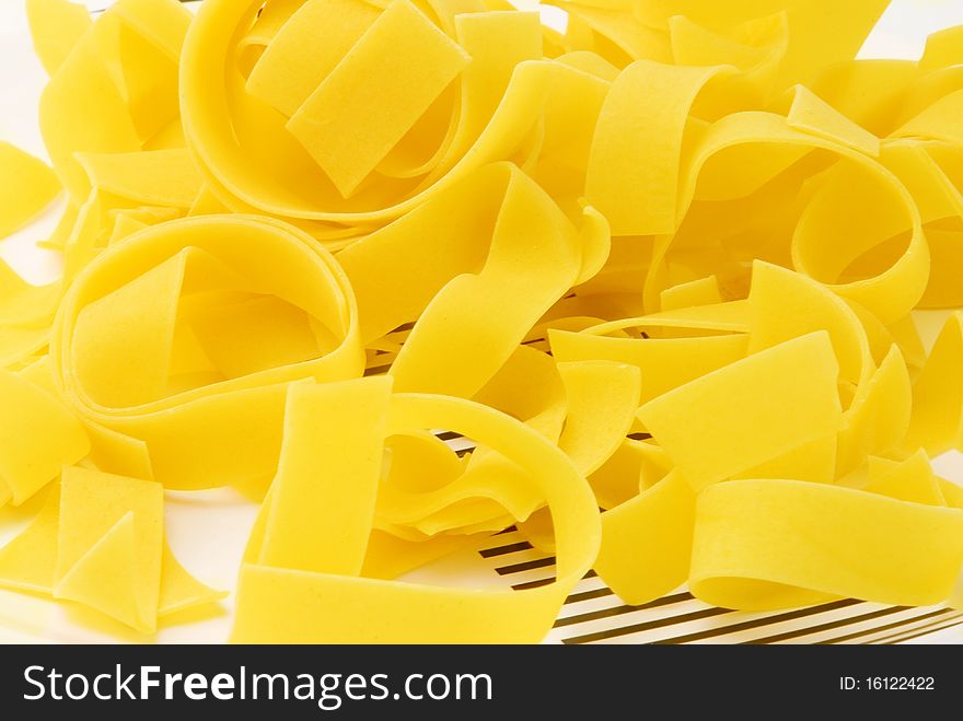 Raw Italian pasta on plate. Raw Italian pasta on plate