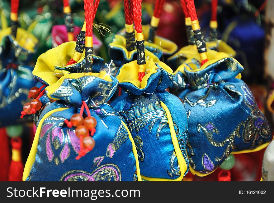 Colorful embroidering bags in Chinese traditional and local style, means happy and lucky.