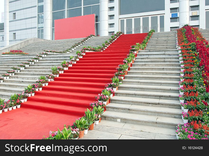Red carpet and marble staircase