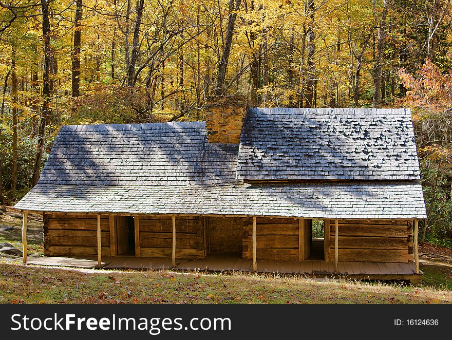 Rustic cabin nestled in the mountains of the Smokies, Tennessee showing all its glorious fall colors. Rustic cabin nestled in the mountains of the Smokies, Tennessee showing all its glorious fall colors.
