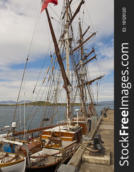 Tall sailing ship moored at the harbour in Oban in Scotland. Tall sailing ship moored at the harbour in Oban in Scotland
