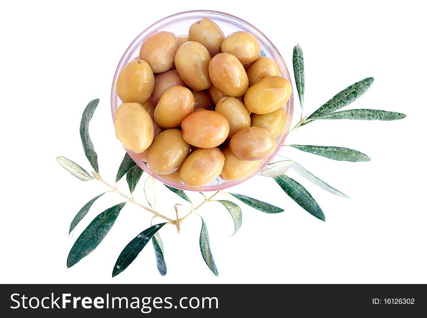 Green olives with leaves isolated on white background