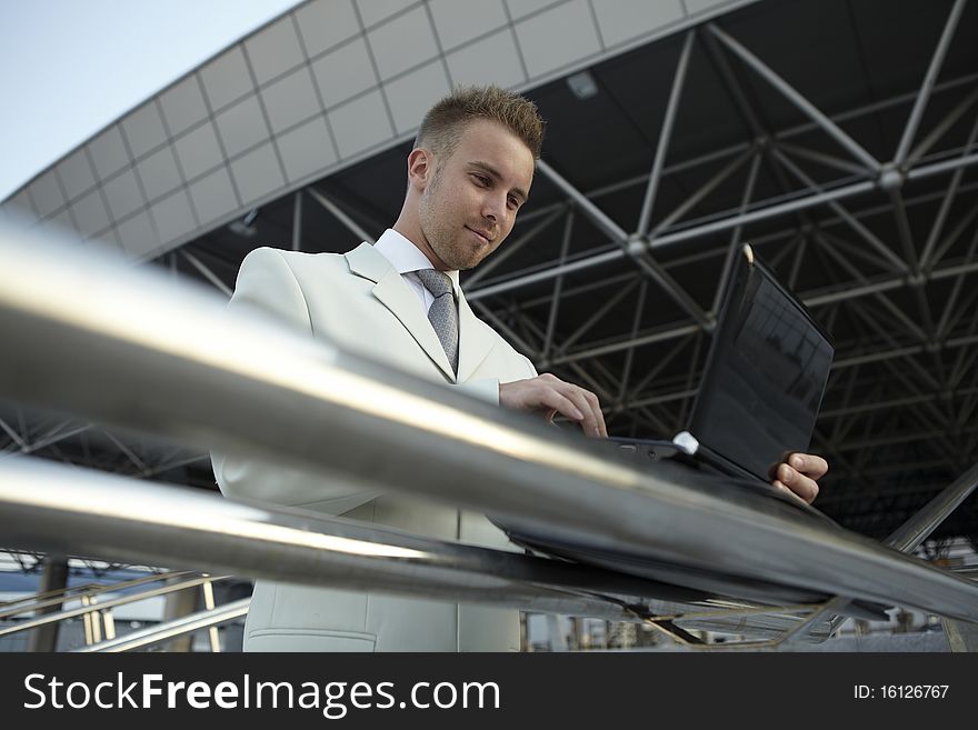 Businessman portrait with laptop. photo