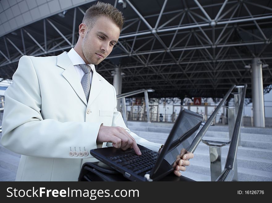 Businessman portrait with laptop. photo