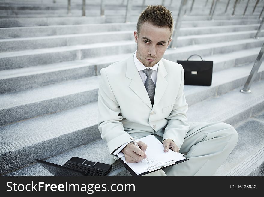 Businessman portrait with laptop. photo