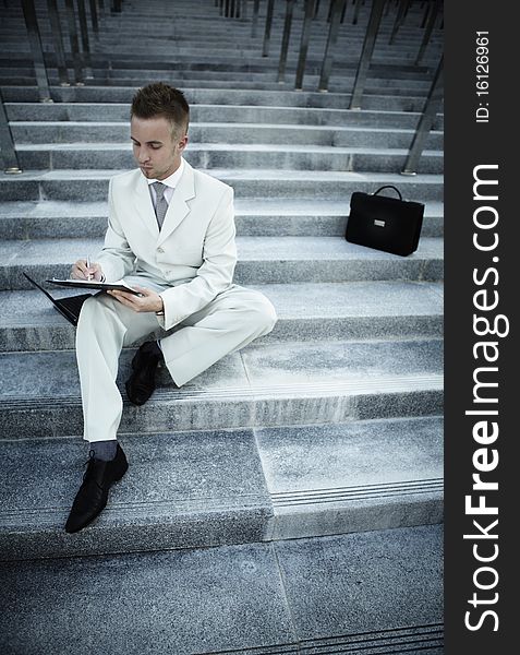 Businessman portrait on stairs