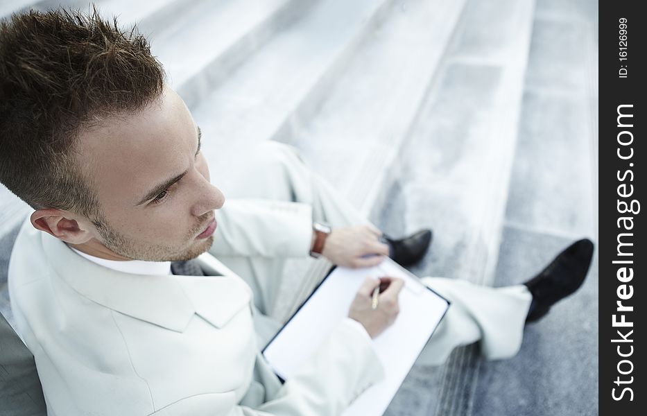 Businessman portrait on stairs