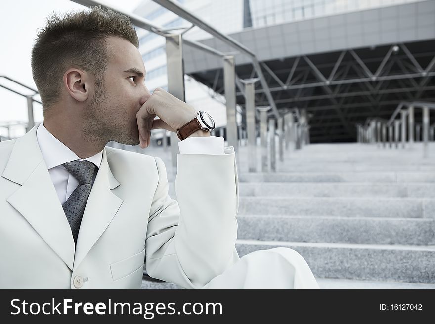 Businessman portrait on stairs