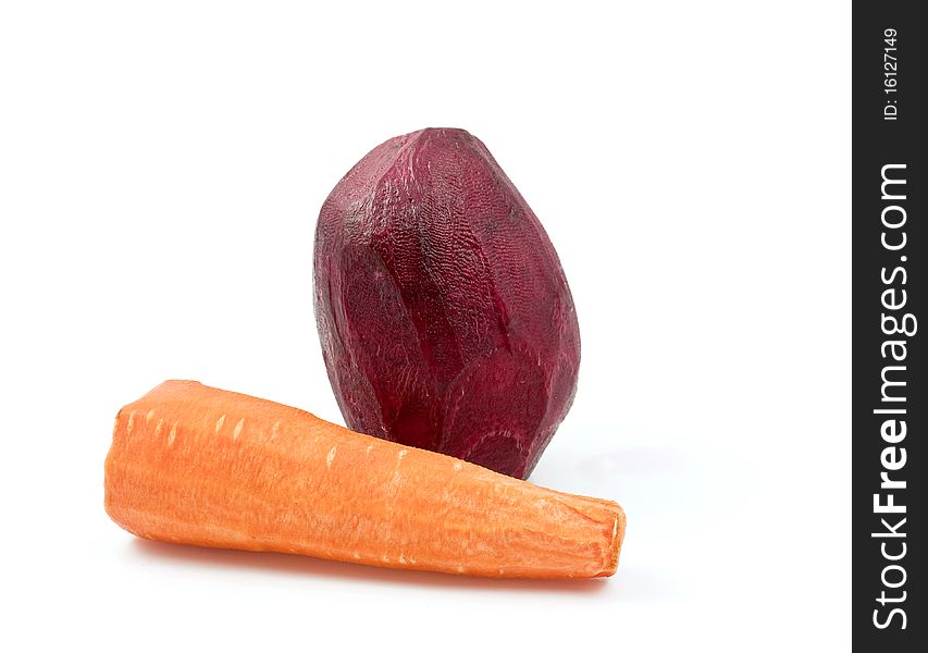 Beets and carrots on a white background