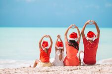 Happy Family With Two Kids In Santa Hat On Summer Vacation Royalty Free Stock Image Happy Family With Two Kids In Santa Hat On Summer Vacation Royalty Free Stock Image