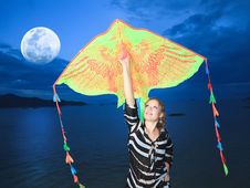 Woman With Kite Royalty Free Stock Photography