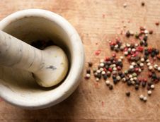 A Still Life With Pepperand A Mortar With A Pestel Stock Photography A Still Life With Pepperand A Mortar With A Pestel Stock Photography