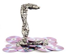 Tie In The Form Of A Snake On Dvd Disks (2).jpg Royalty Free Stock Images