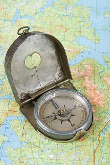 Compass On Topographical Map Stock Photo Compass On Topographical Map Stock Photo