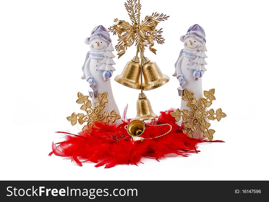 Christmas snowmans with golden bells and golden stars on the red feathers