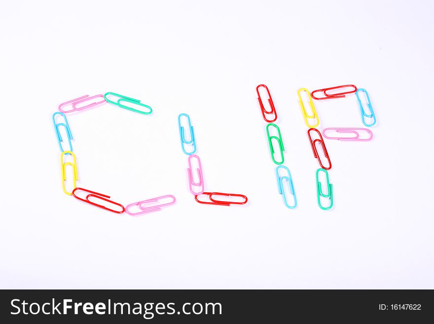 Paper clip with colorful and white background. Paper clip with colorful and white background