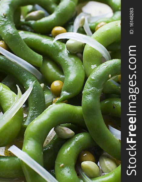 Fresh green bean salad with onion and vinegar close up