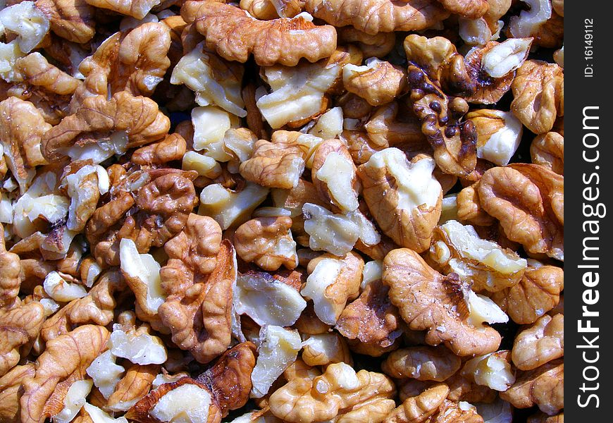 Detail photo texture of the walnuts background. Detail photo texture of the walnuts background