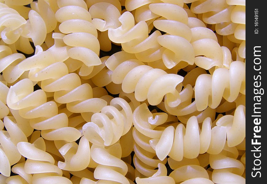 Detail photo of the spiral pasta background