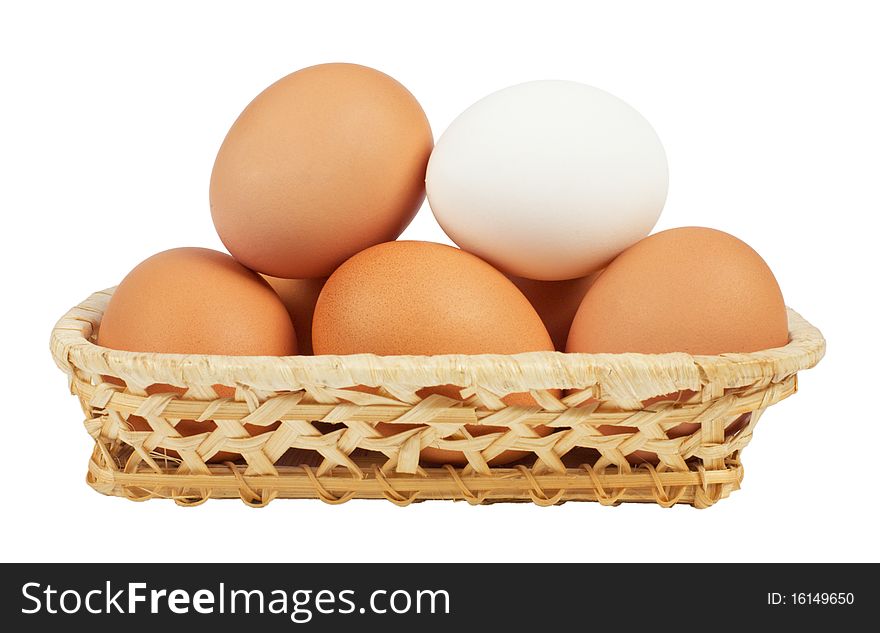 Brown eggs in the basket,isolated on white with clipping path