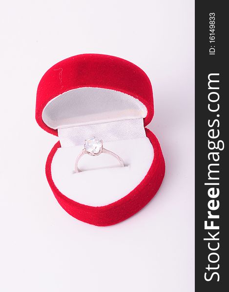 Diamond engagement ring in a red box. Diamond engagement ring in a red box