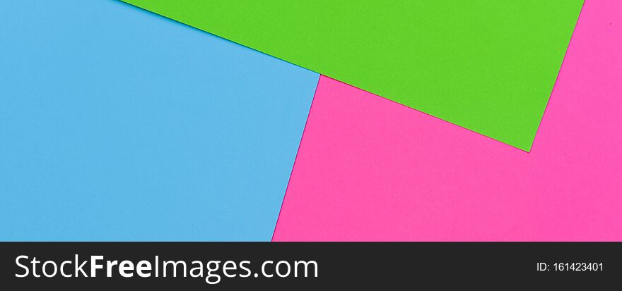 Bright paper background of several colors. Background for any text and logo. Banner for the site.