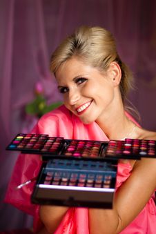 Beautiful Girl With Set Of Lipsticks For Make-up Royalty Free Stock Images