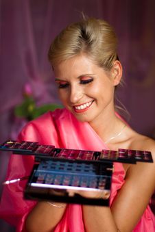 Beautiful Girl With Set Of Lipsticks For Make-up Stock Images