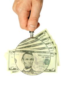 Dollar Bill And Hand Holding Magnifying Glass Stock Photos