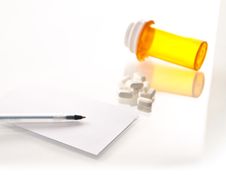Medicine Bottle, Pills, Prescription And Pen Stock Photo