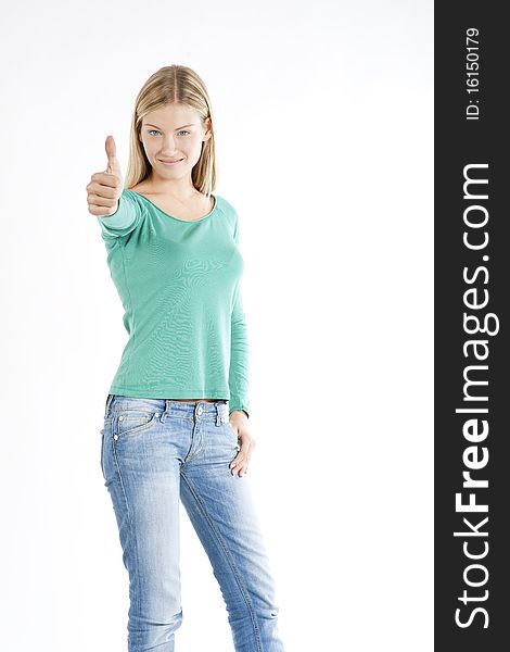 Beautiful teenage girl with thumbs-up, isolated on white