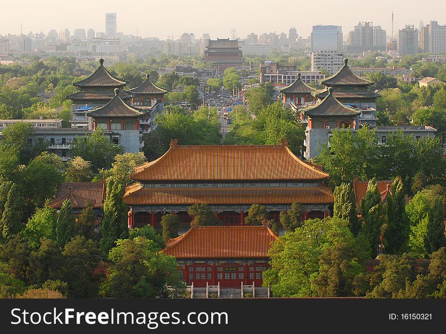 Forbidden city is surrounded by modern buildings. Forbidden city is surrounded by modern buildings.