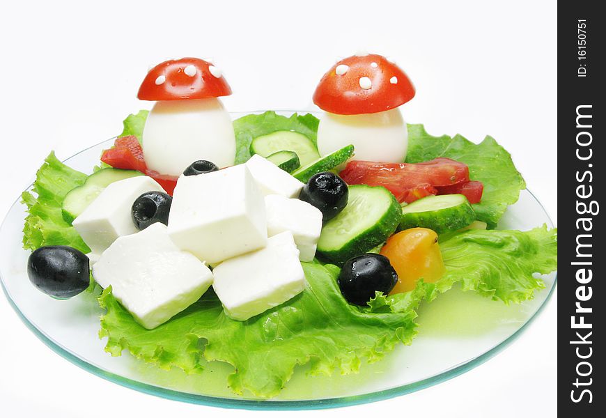 Creative vegetable salad with mushrooms made of egg and tomato