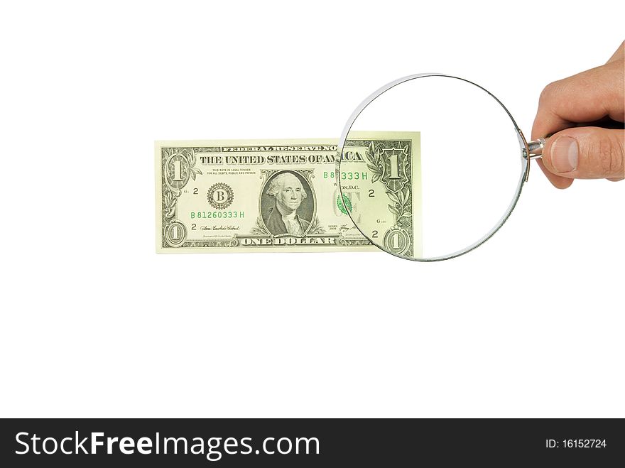 Dollar bill and hand holding magnifying glass isolated on white background