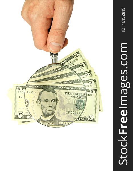 Dollar bill and hand holding magnifying glass isolated on white background