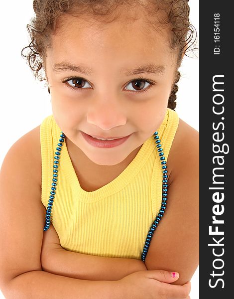 Adorable three year old hispanic-african american girl close up.