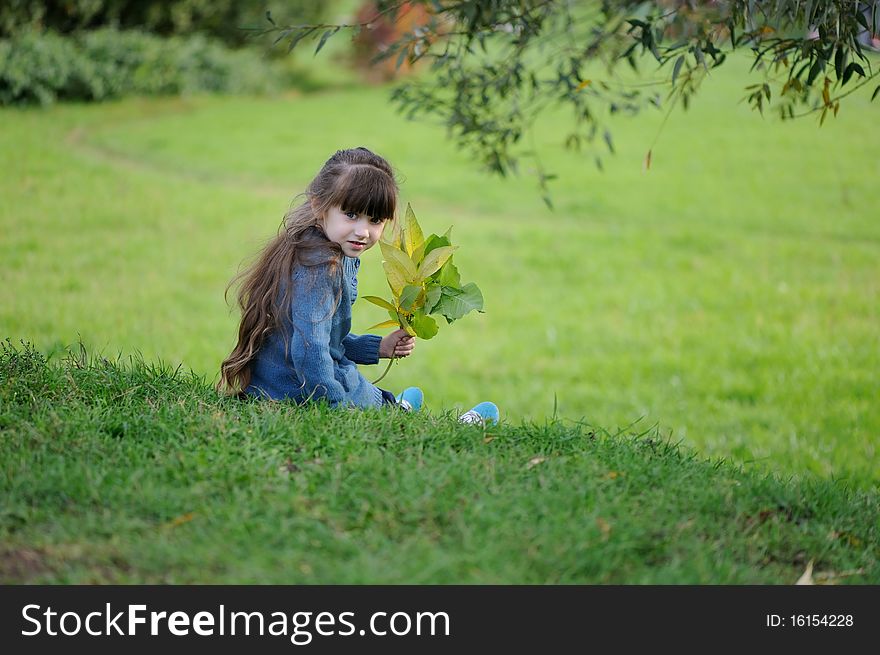 Adorable Small Girl On The Hill