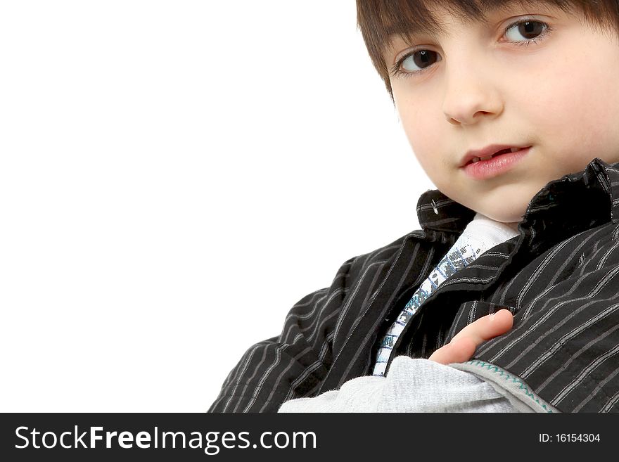 Adorable six year old french american boy with dark shaggy hair and brown eyes. Adorable six year old french american boy with dark shaggy hair and brown eyes.