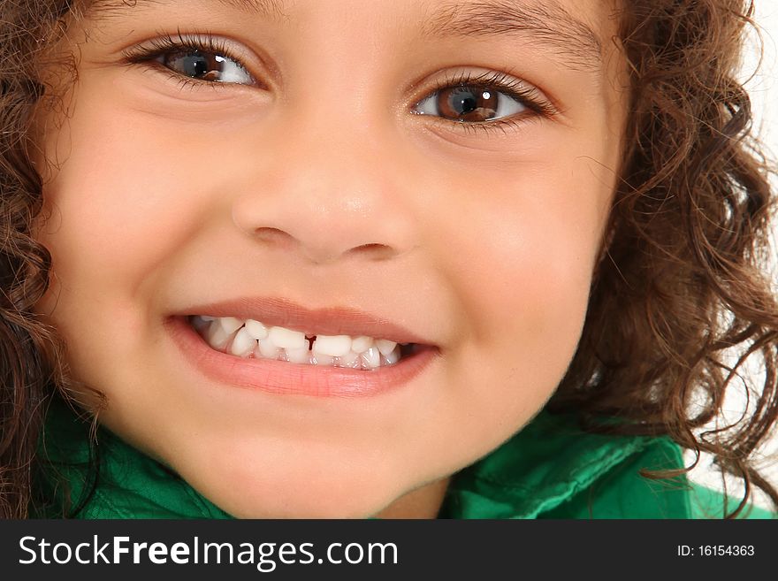 Adorable 3 year old hispanic american girl close up smiling. Adorable 3 year old hispanic american girl close up smiling.