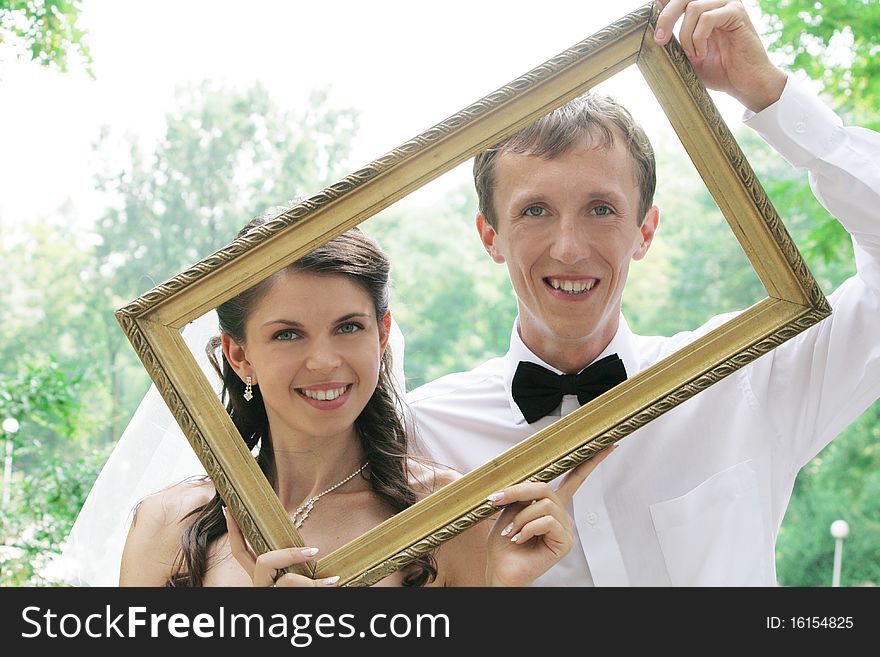 Portrait of smiling bride and groom. Portrait of smiling bride and groom