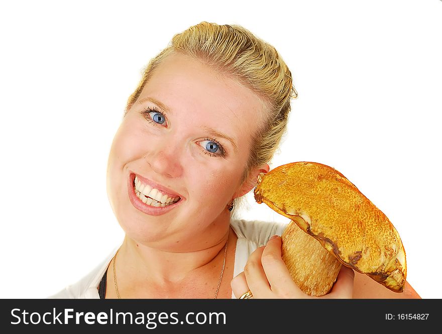 Blond woman with big wild mushroom isolated on the white. Blond woman with big wild mushroom isolated on the white.