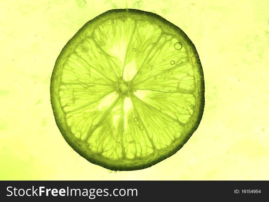 A slice of lemon in water.