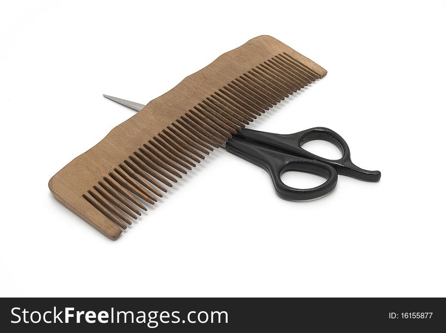 Comb and clipper on white