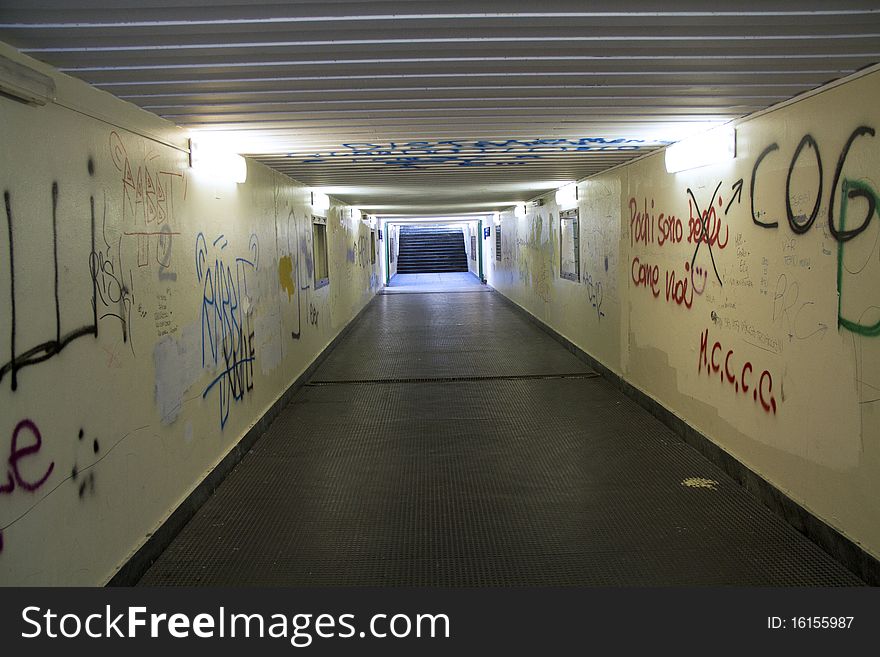 Pedestrian underpass with graffiti on the walls