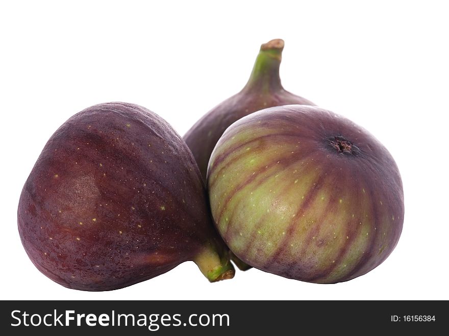 Three fresh figs isolated on white. Three fresh figs isolated on white