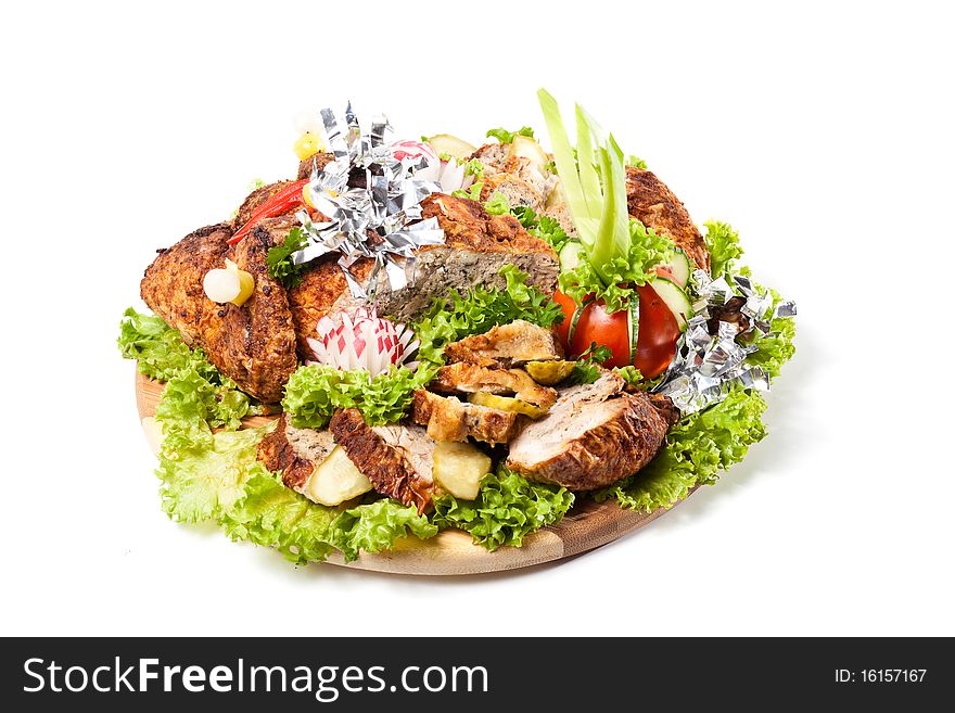 Meat pie decorated vegetables and herbs on white background